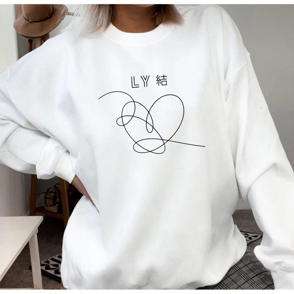 BTS Sweatshirt with a Love Yourself heart artwork, shown in a cosy fan-made style.